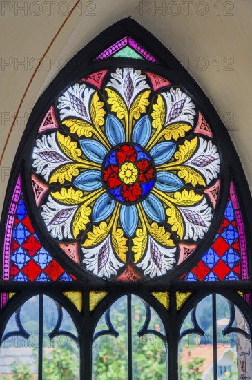 Colourful pointed arch window, St. Bartholomew's Parish Church, Hopferbach, Allgäu, Bavaria,