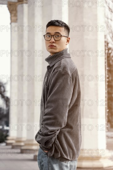 Young japanese man portrait side view