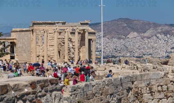 A picture of a crowd of tourists at the Acropolis of Athens