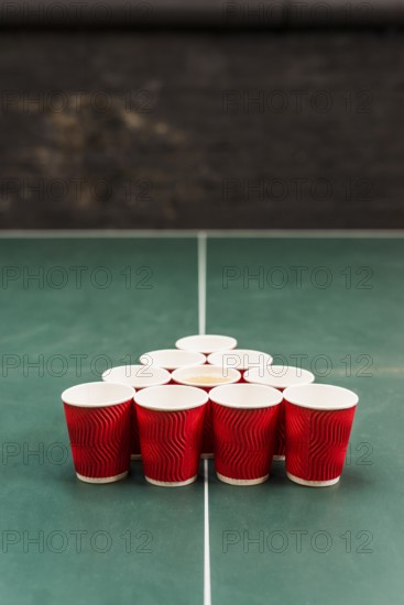 Red cups table beer pong tournament