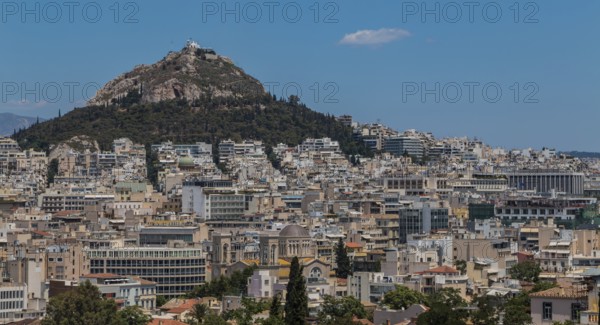 A picture of the Lycabettus hill as seen from the top of the Acropolis Museum (Athens)
