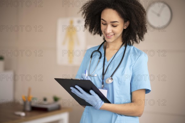 Female doctor taking notes clipboard