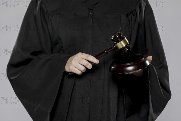 Front view female judge with gavel. Resolution and high quality beautiful photo