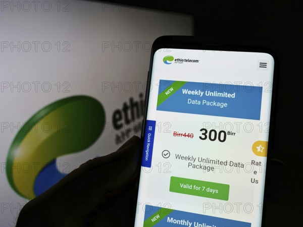 Stuttgart, Germany, 01-09-2022: Person holding cellphone with webpage of Ethiopian