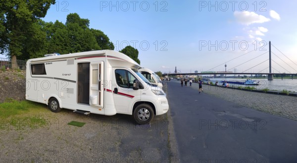 A motorhome parked at the Düsseldorfer Rheinuferpromenade motorhome park. Düsseldorf, North