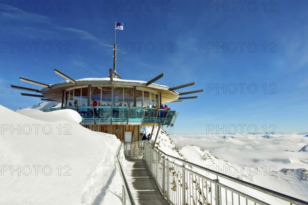 View from the Top Mountain Star panorama bar on Wurmkogl, cloud cover over Oetztal Alps, Obergurgl,
