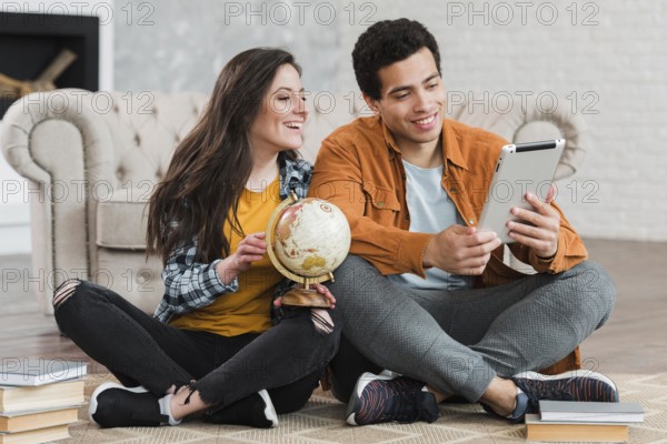 Couple learning geography online