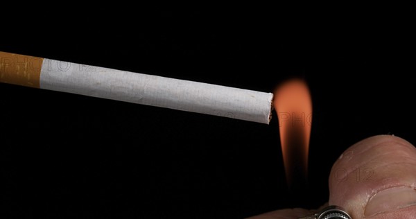 Cigarette that Consumes on Black Background