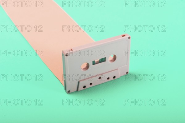 Close up retro cassette tape blue background