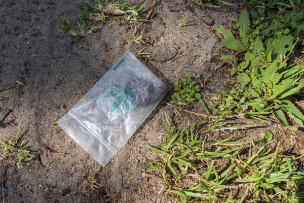 Germany, Berlin, 07. 05. 2020, plastic bag, cannabis_logo, Mauerpark, Europe