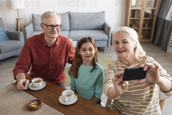 Grandparents girl taking selfie
