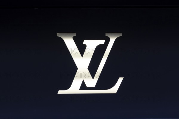 Close-up, logo of the French luxury fashion brand Louis Vuitton on a boutique in the shopping