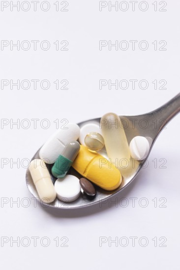 Symbolic image drug abuse, addiction, burnout, pharmacy, close-up of various pills and tablets on a