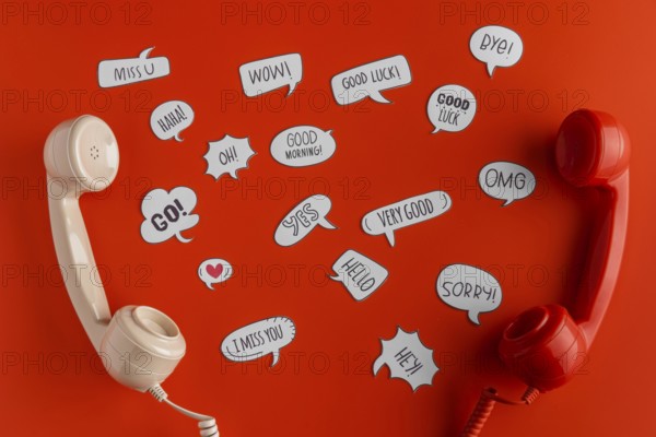 Top view selection chat bubbles with two telephone receivers