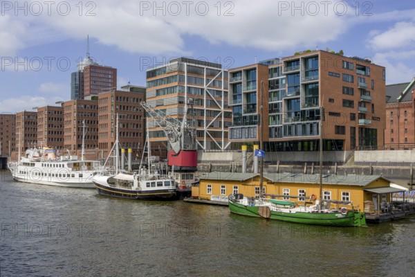 Sandtorhafen, traditional ship harbour and modern buildings in the Hafencity, Hamburg