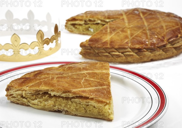 Galette des Rois and its crown, French royal cake for Epiphany