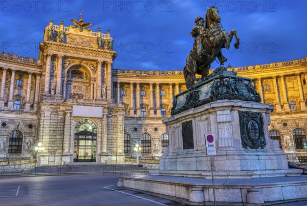 The Prince Eugene statue with part of the Hofburg Imperial Palace in Vienna by night