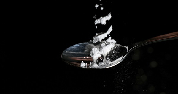 Drug, Cocaine in spoon against black background