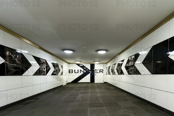 Unfamiliar perspective of the hallway at the Berlin Anhalter Bahnhof undergroundstation with the