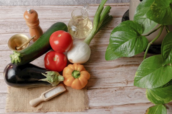 Top view of a group of fresh assorted vegetables to prepare a vegetarian menu, bell pepper, onion,