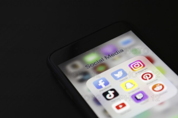 Social media icon, detailed view of a smartphone with social media apps, Facebook, Twitter,