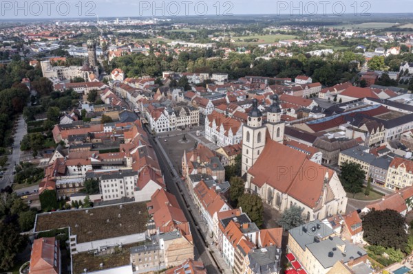 Drone shot, aerial view, drone photo, picture from above, historic town church St. Marien, view