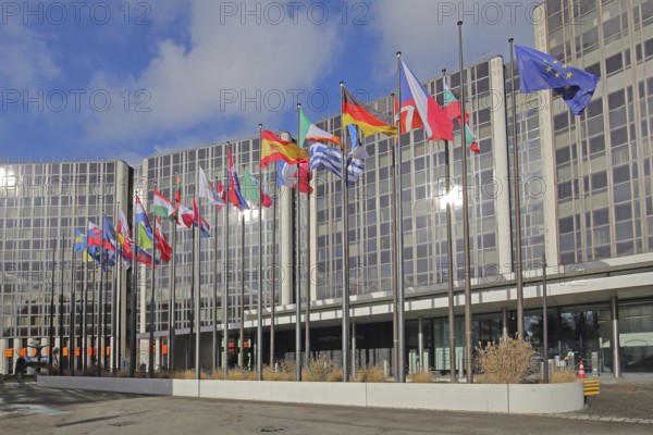 Modern building Winston Churchill with row of European national flags, state flag, European, EU