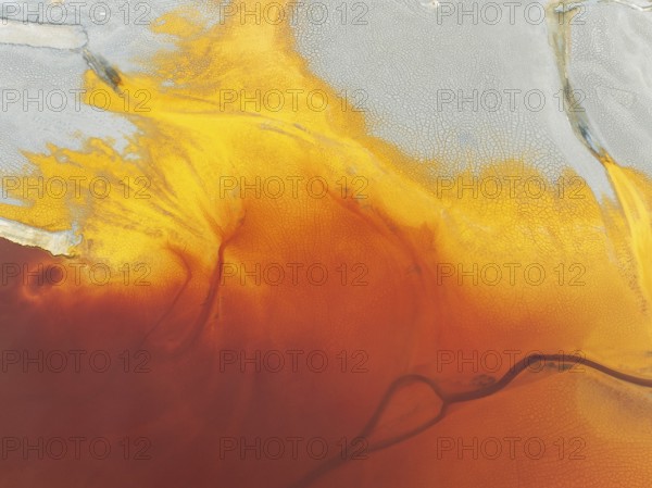 Waste pond in the mineral-rich area of the Rio Tinto mines. The colour is caused by oxidised iron
