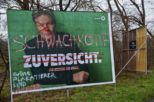 Denigration of a large poster for the 2025 federal election by the Greens with Robert Habeck,