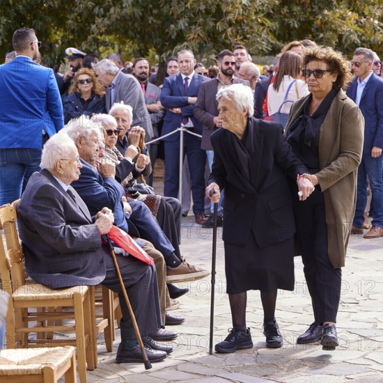 Survivors of the massacre of 3 June 1941, Elderly woman with walking aid at an outdoor gathering of