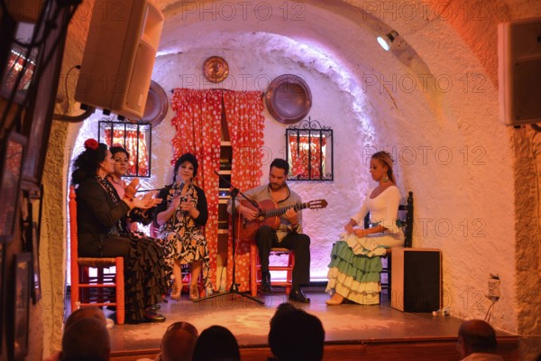 Flamenco performance on the stage of a former cave home, Los Tarantos flamenco club, Sacromonte,