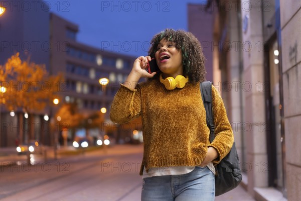 Portrait of black ethnic girl in the early morning going to the university on the way back to