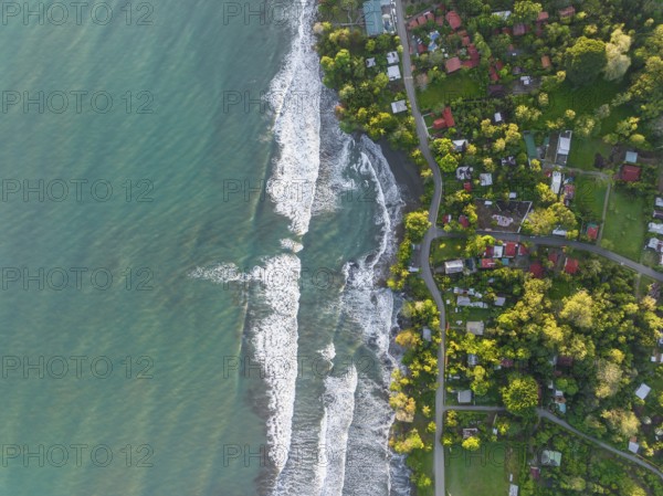 Top-down, aerial view, view of settlement and houses on the coast, Cahuita, Limón, Costa Rica,