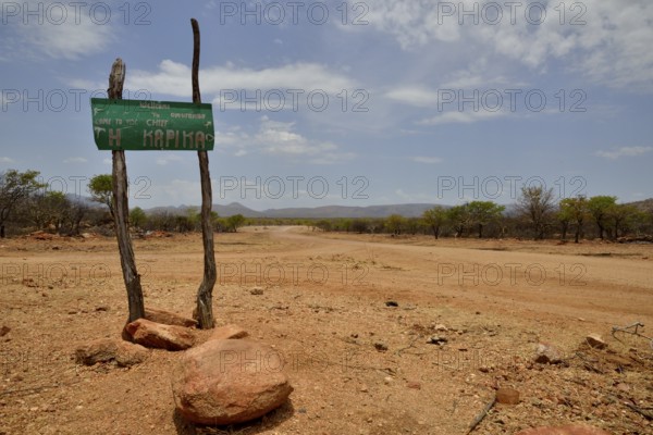 Sign at the entrance to the village of Omuramba, residential village of Chief Hikuminue Kapika, the