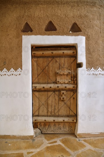 Old door in Al Masmak Fort, historic fortress built in 1865, in the old city of Riyadh, Saudi