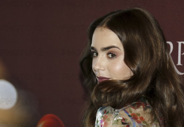 Lily Collins at the 'Les Miserables' Photo Call held at the Linwood Dunn Theater in Hollywood, USA