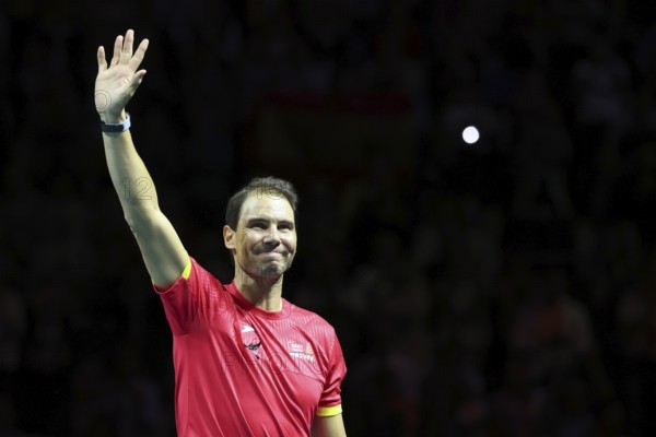Rafael Nadal (ESP) waving during a tribute ceremony as he retires from playing professional tennis