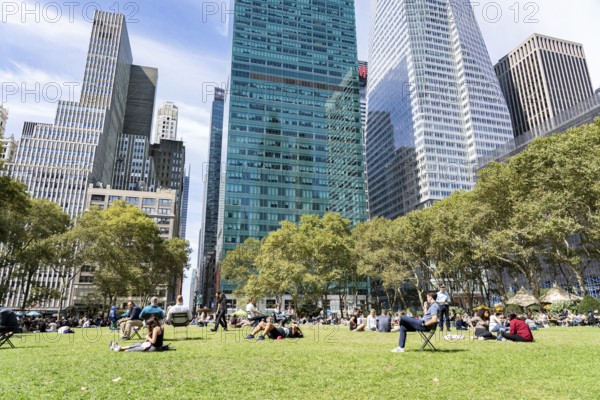 New York, United States of America, September 20, 2019: People on the grass lawn in Bryant Park in