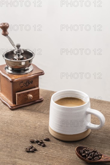 High angle coffee grinder with mug coffee beans