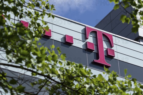 Telekom logo on the façade of the Telekom administration at Heiligengeistfeld in Hamburg, Germany,