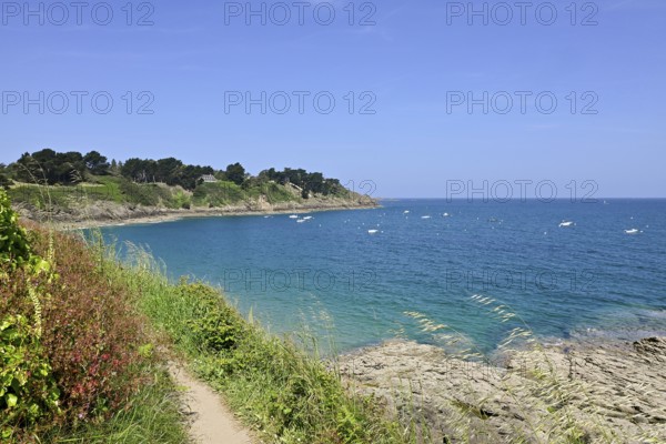 Coastal hiking trail on the Emerald Coast near Saint-Lunaire, Ille-et-Vilaine, Brittany, France,