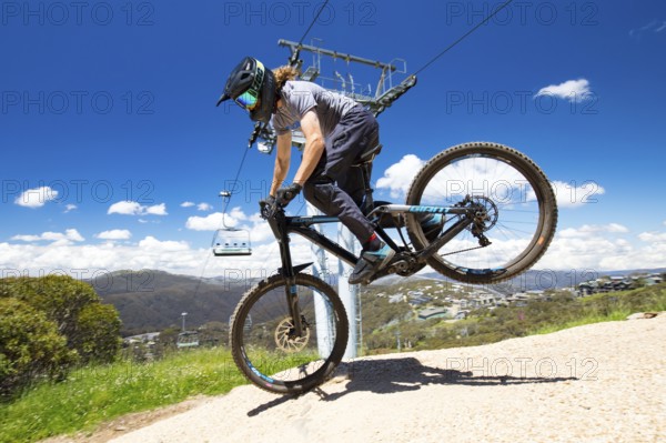 Mt Buller, Australia, January 2 2018: Downhill mountain bike riders attempt the ABOM and
