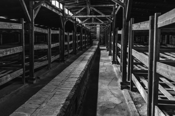 Auschwitz, Poland - 15 September, 2021: black and white view of view of the interior of one of the