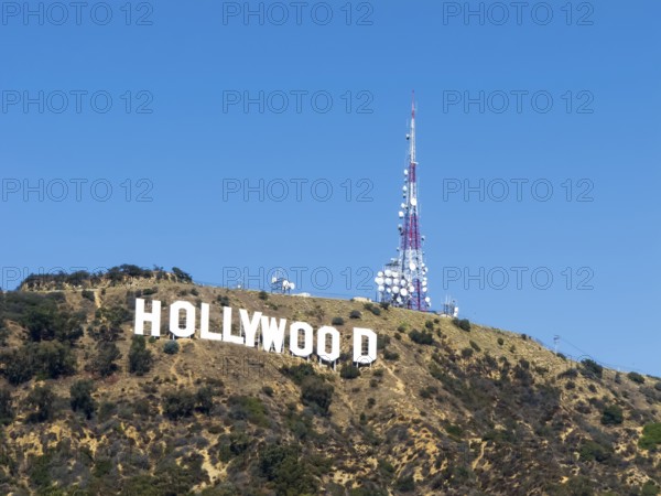 The Hollywood Sign (formerly the Hollywoodland Sign) is a landmark and American cultural icon