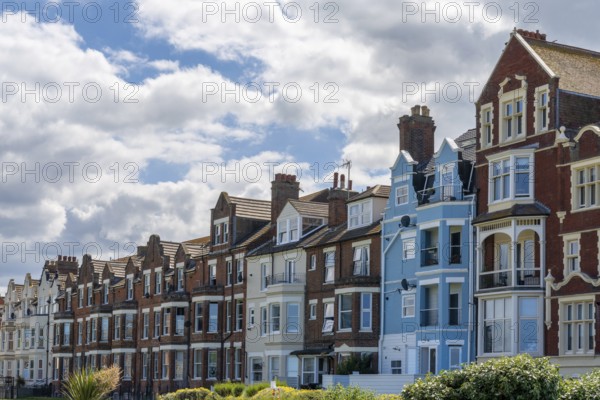 Cromer, United Kingdom - 13 June, 2022: colorful English rowhouses and town houses in the historic