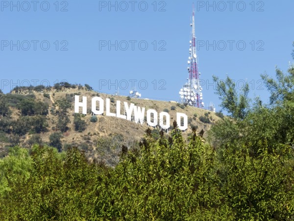 The Hollywood Sign (formerly the Hollywoodland Sign) is a landmark and American cultural icon