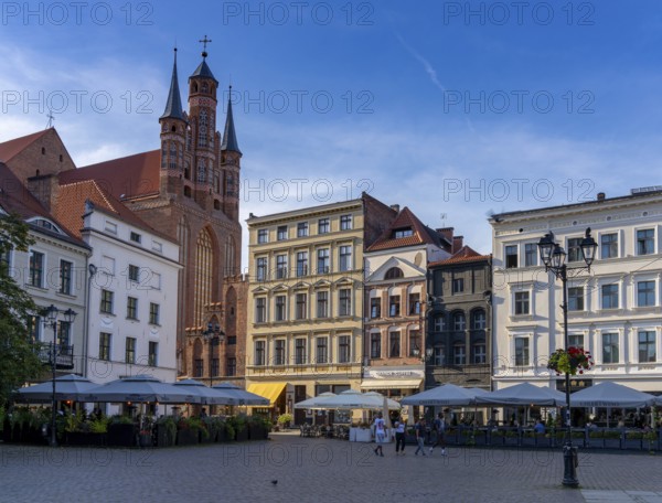 Torun, Poland - 6 September, 2021: view of the main square in historic old town of Torun with Saint