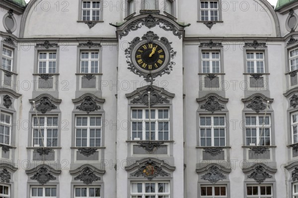 Detail of the historic town hall with Renaissance-style clock on the market square in the old town