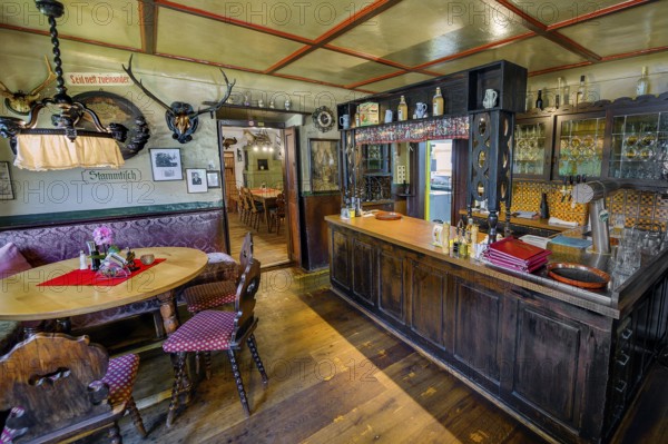 Regulars' table and bar in the Gasthof Adler, heritage-protected historic country inn, built around