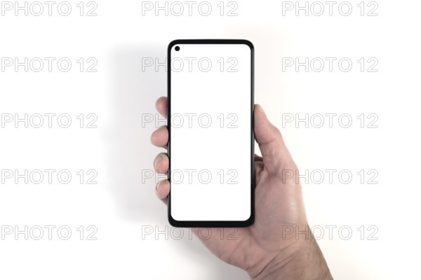 hand holding smartphone with blank white screen against white background, person using smartphone
